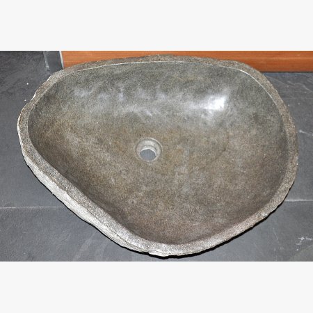 Wash basin made of basalt boulder