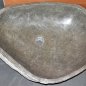 Wash basin made of basalt boulder