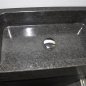 Wash basin made of Nero Assoluto with steel furniture