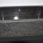 Wash basin made of Nero Assoluto with steel furniture