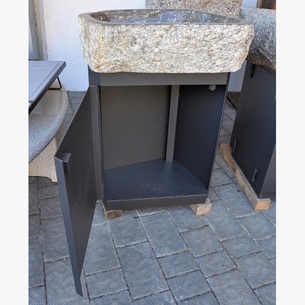 Wash basin made of tonalite from Texel area with steel furniture