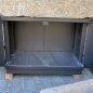 Old, deep feeding trough with steel furniture