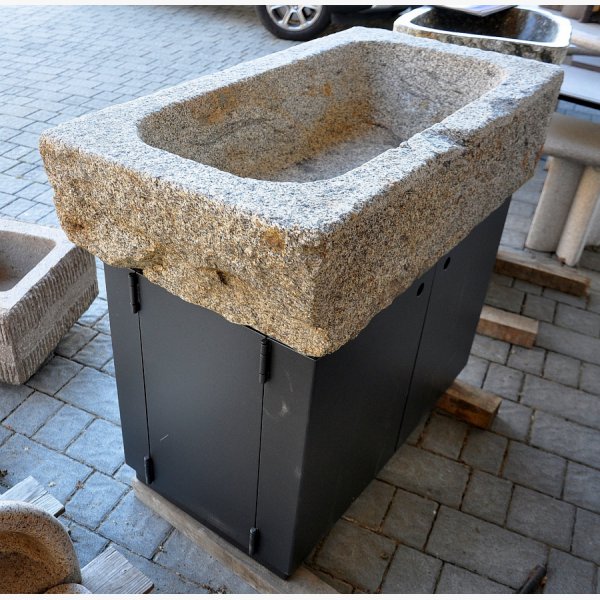 Old, deep feeding trough with steel furniture