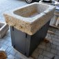 Old, deep feeding trough with steel furniture