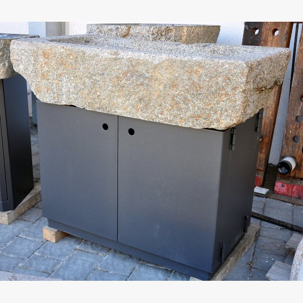 Old, deep feeding trough with steel furniture