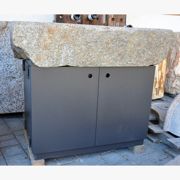 Old, deep feeding trough with steel furniture