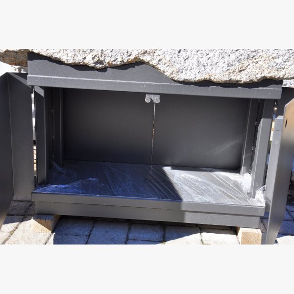Old, deep feeding trough with steel furniture