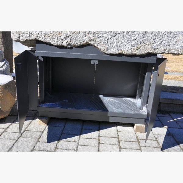 Old, deep feeding trough with steel furniture
