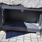 Old, deep feeding trough with steel furniture