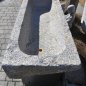 Old, deep feeding trough with steel furniture