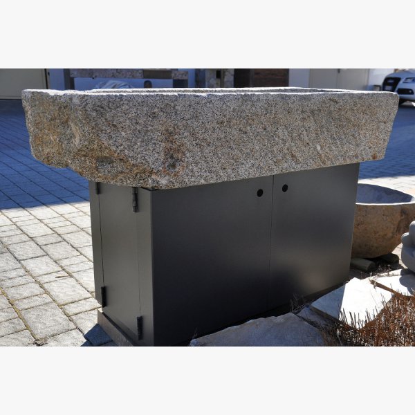 Old, deep feeding trough with steel furniture