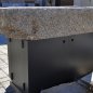 Old, deep feeding trough with steel furniture