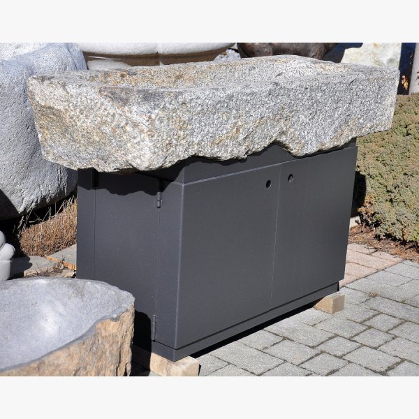 Old, deep feeding trough with steel furniture