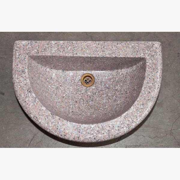Basin in pink granite