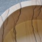 Round sandstone washbasin with slant on top