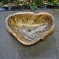 Lavabo in legno fossilizzato di colore giallastro