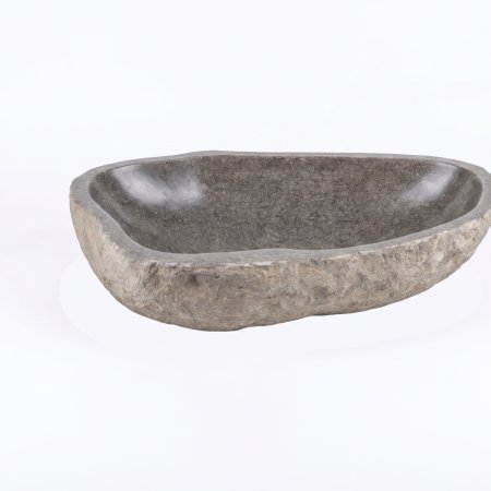 Massives Aufsatzwaschbecken aus grauem Granit-Findling auf einer Waschtischplatte