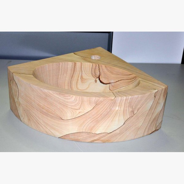 Corner washbasin made of sandstone