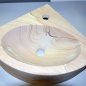 Corner washbasin made of sandstone