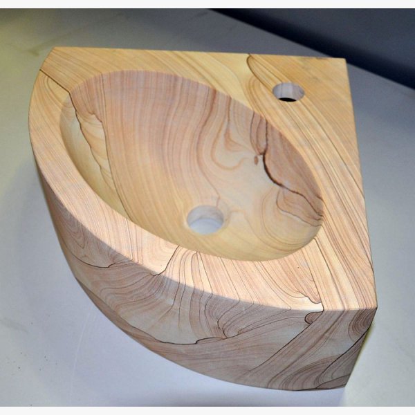Corner washbasin made of sandstone