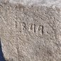 Antiker gräulicher Mörser umgerüstet zu einem Natursteinbrunnen aus Granit mit der Jahreszahl 1844