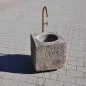 Antiker gräulicher Mörser umgerüstet zu einem Natursteinbrunnen aus Granit mit der Jahreszahl 1844 | © ©Gasser Naturstein