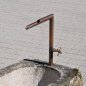 Old feeding trough converted into a natural stone garden fountain | © ©Gasser Naturstein