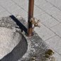 Old feeding trough converted into a natural stone garden fountain
