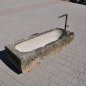 Old feeding trough converted into a natural stone garden fountain | © ©Gasser Naturstein