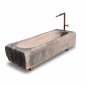 Antique feeding trough converted into a natural stone garden fountain | © ©Gasser Naturstein