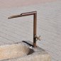 Antique feeding trough converted into a natural stone garden fountain