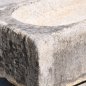 Antique feeding trough converted into a natural stone garden fountain