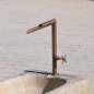 Antique feeding trough converted into a natural stone garden fountain | © ©Gasser Naturstein