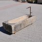 Antique feeding trough converted into a natural stone garden fountain | © ©Gasser Naturstein