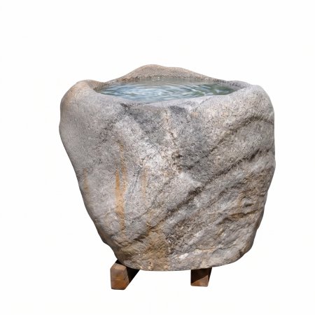 Rustikaler Gartenbrunnen aus unbehandeltem Naturstein-Findling mit ausgehöhlter Wasserschale